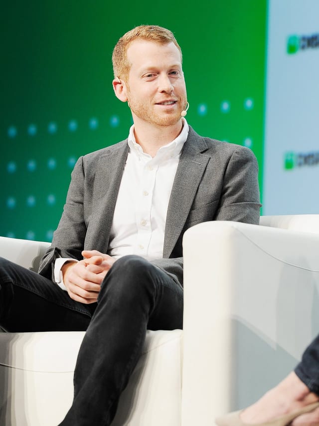 Kyle Vogt speaking on stage with a headset microphone at TechCrunch Disrupt San Francisco 2018