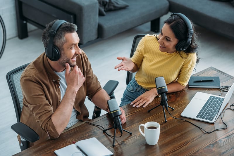Podcast microphone and audio interface on a desk