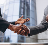 african business male people shaking hands
